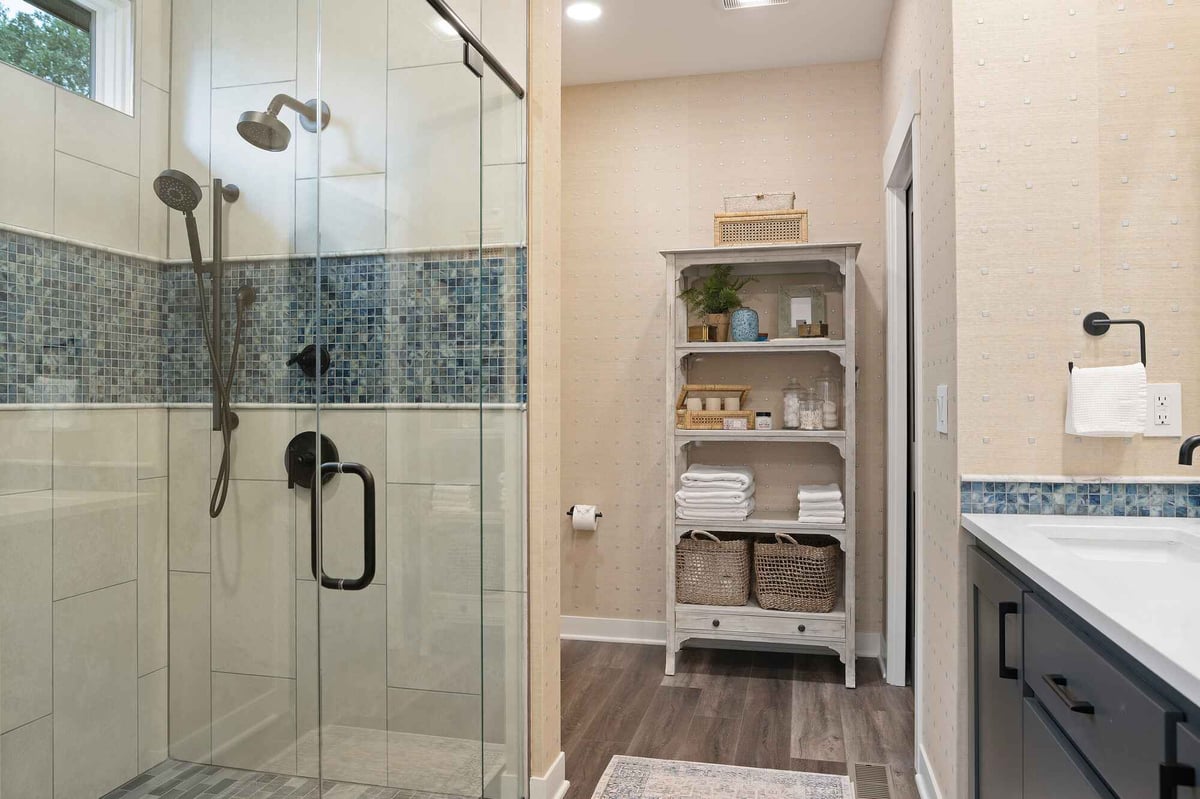 bathroom remodel with large glass shower wall